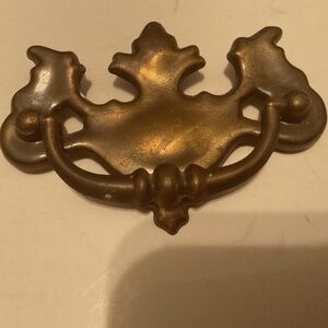 Vintage metal batwing like drawer handle,